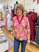 Umgee ecru paisley V-neck top with magenta trim and 3/4 balloon sleeves