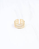 Gold four-row adjustable open-back ring with crystal pavé and textured bands