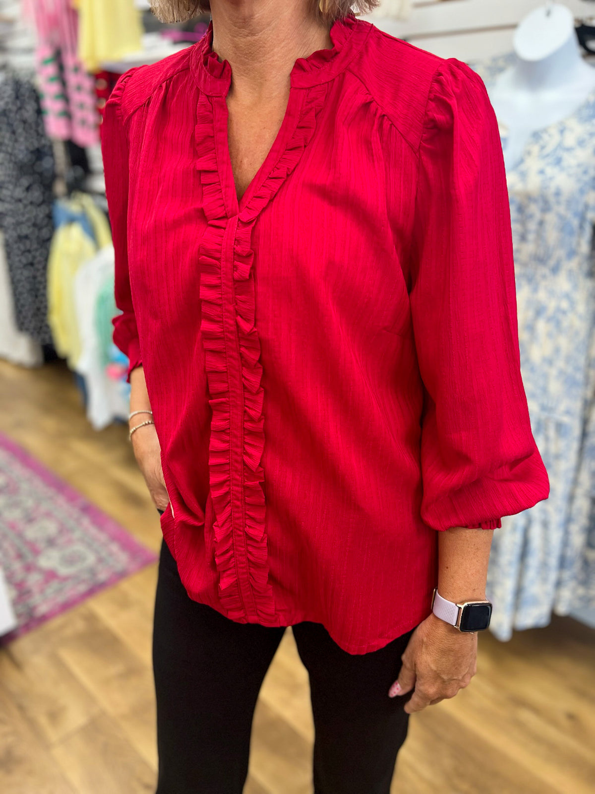 Crimson red ruffle-trim V-neck blouse with three-quarter balloon sleeves by Umgee