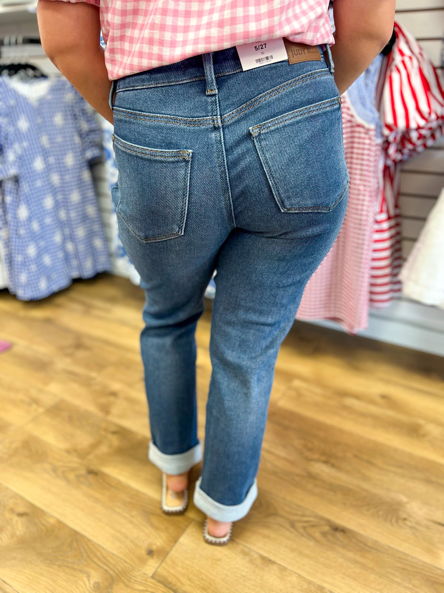 Judy Blue medium wash boyfriend jeans with cuffed hem, back view