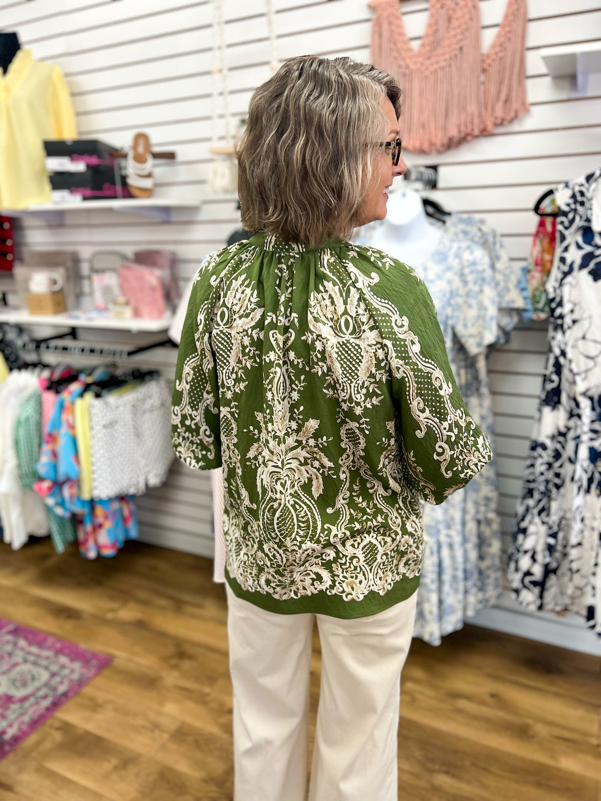 Olive green boho border print top with cream floral pattern and 3/4 balloon sleeves
