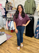 Wine polka dot V-neck top with pink dots and short dolman sleeves