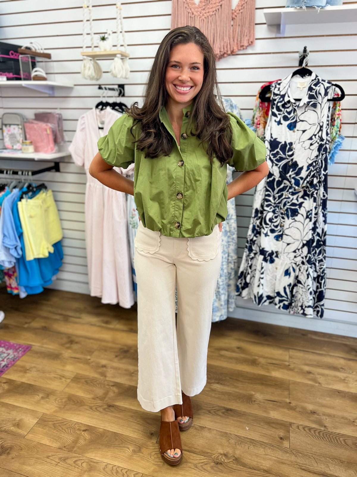 Ecru wide leg pants with scallop trim pockets and cuffed hem by Entro