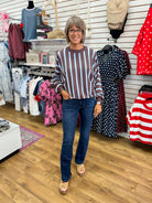 Ash brown and blue vertical striped sweater with long batwing sleeves