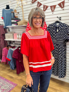 She + Sky red short sleeve top with white contrast stripe details