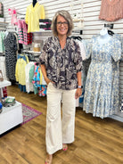 Black and cream paisley boho blouse with 3/4 sleeves and V-neckline