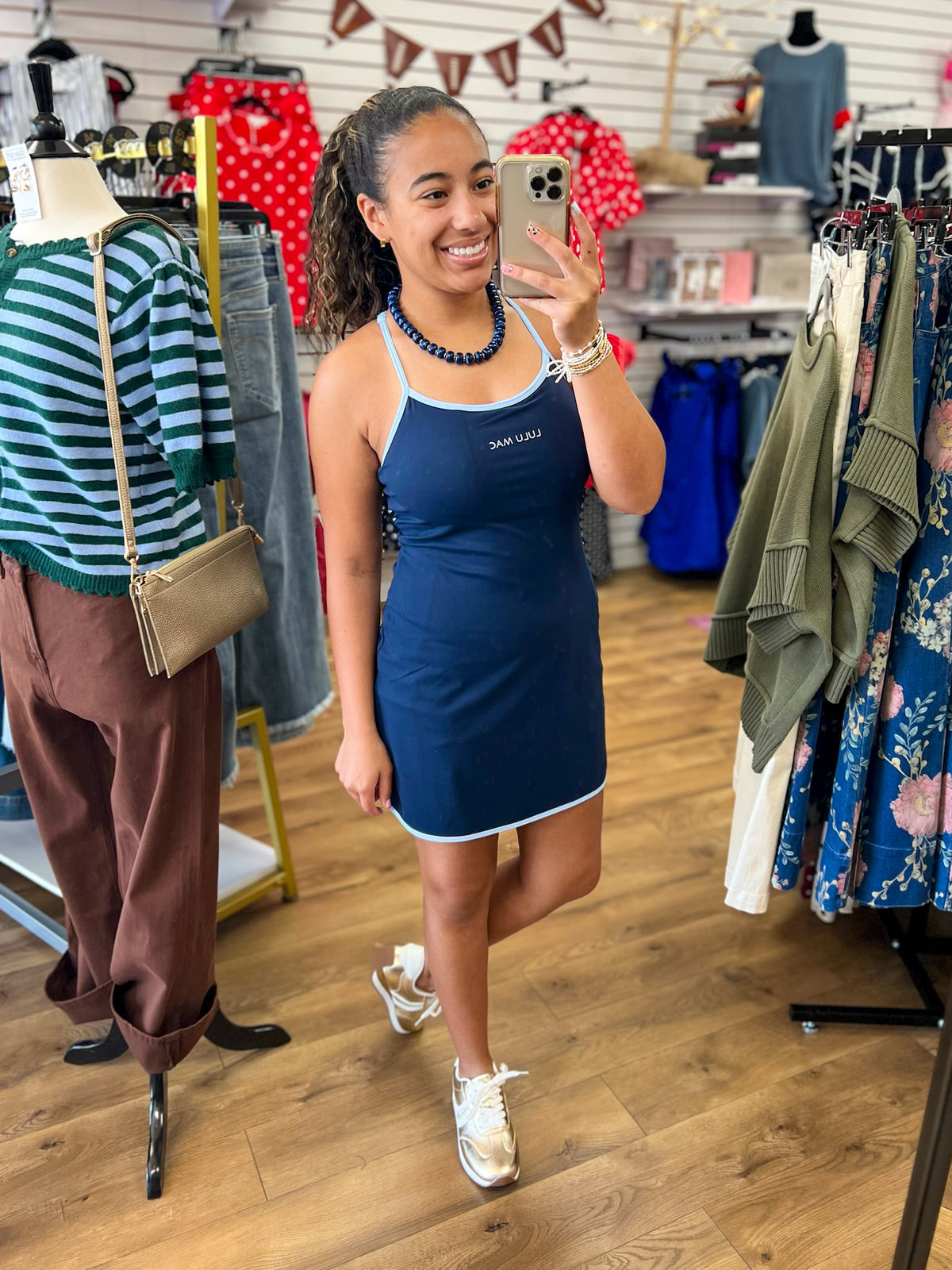 Lulu Mac navy blue athletic mini dress with light blue trim and spaghetti straps