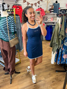 Lulu Mac navy blue athletic mini dress with light blue trim and spaghetti straps