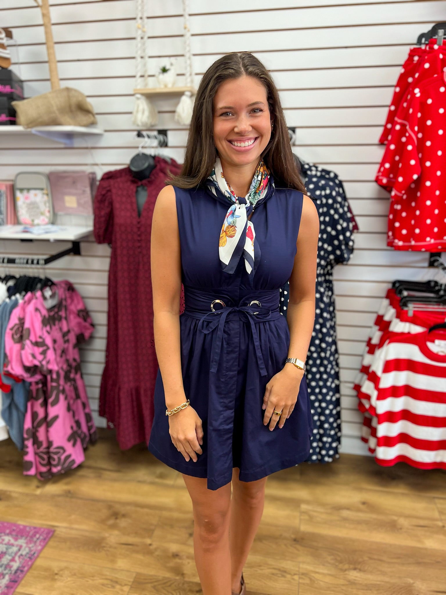 Navy sleeveless V-neck mini dress with removable belt and floral neck scarf