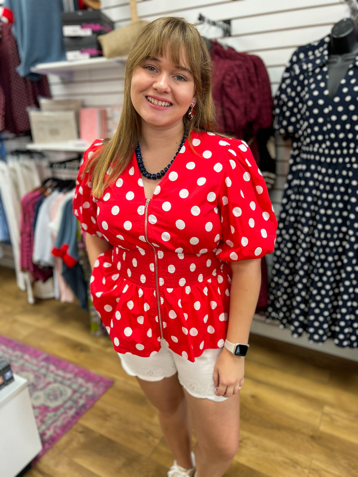 She + Sky red white polka dot zip-front puff sleeve top on model