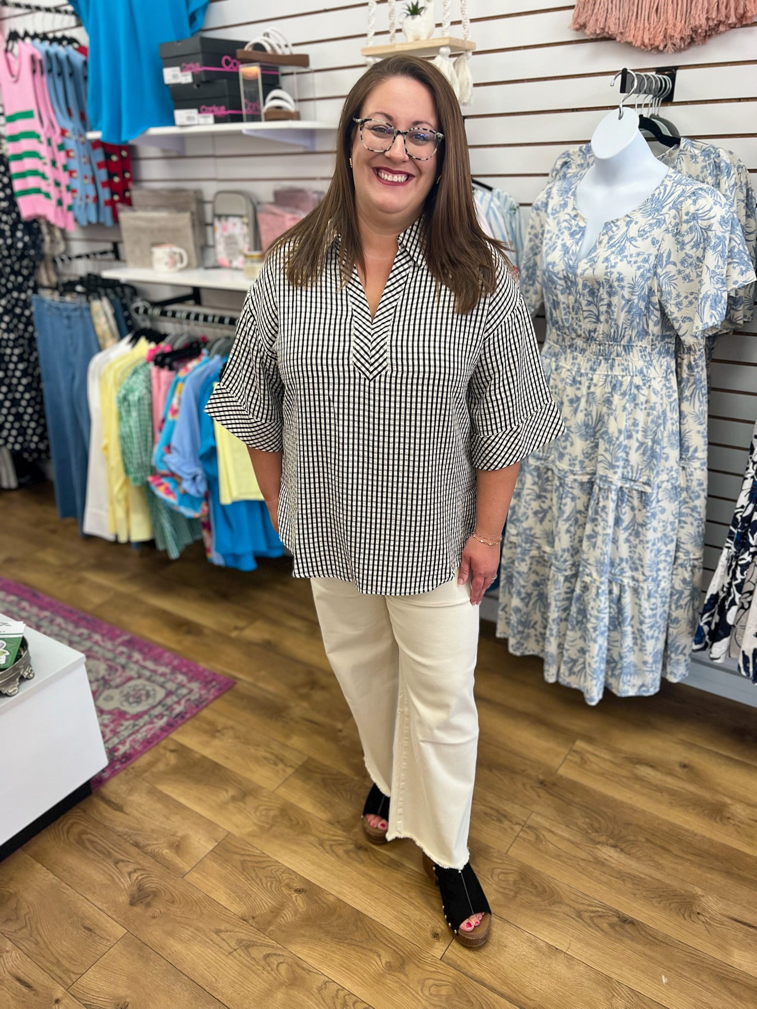 Black and white gingham V-neck top with 3/4 sleeves by Entro