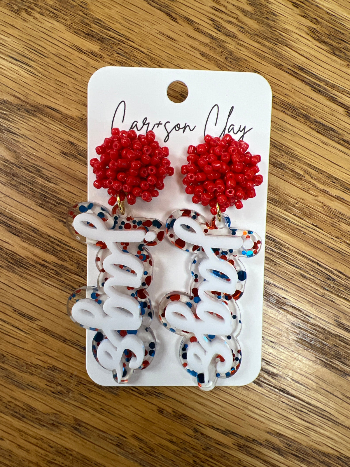 Red seed bead and confetti acrylic dangle earrings by Car+son Clay