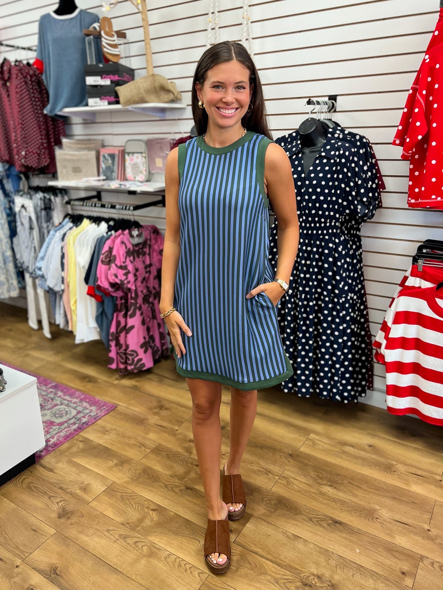 Hunter green and blue vertical striped sleeveless mini dress with pockets