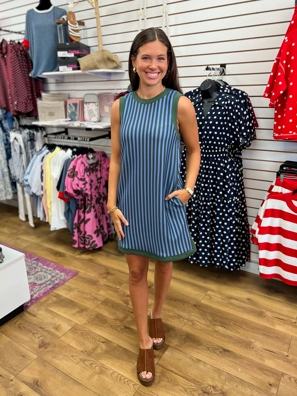 Hunter green and blue vertical striped sleeveless mini dress with pockets