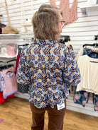 Blue Floral Top with Puff Sleeves and Ruffle Hem - A'Bekah's Boutique