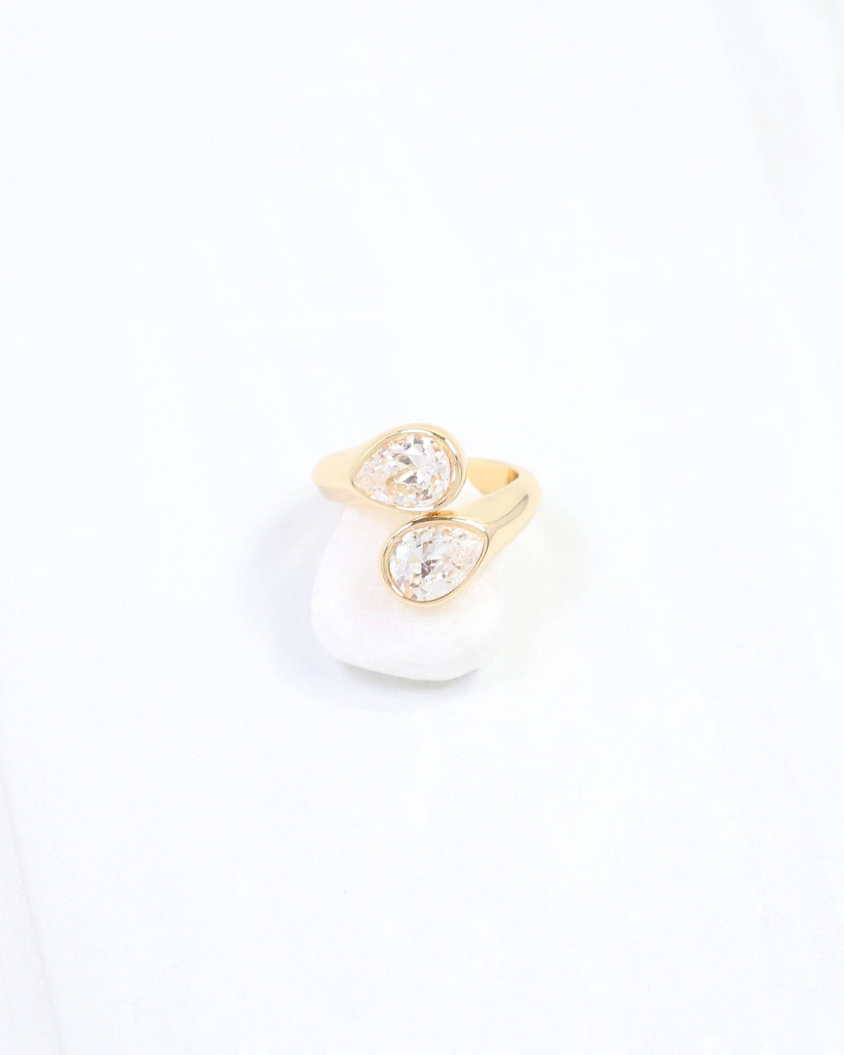 Gold adjustable ring with two bezel-set teardrop clear CZ stones