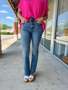 Judy Blue Medium Denim Double Button Bootcut Jeans with Frayed Hem - A'Bekah's Boutique