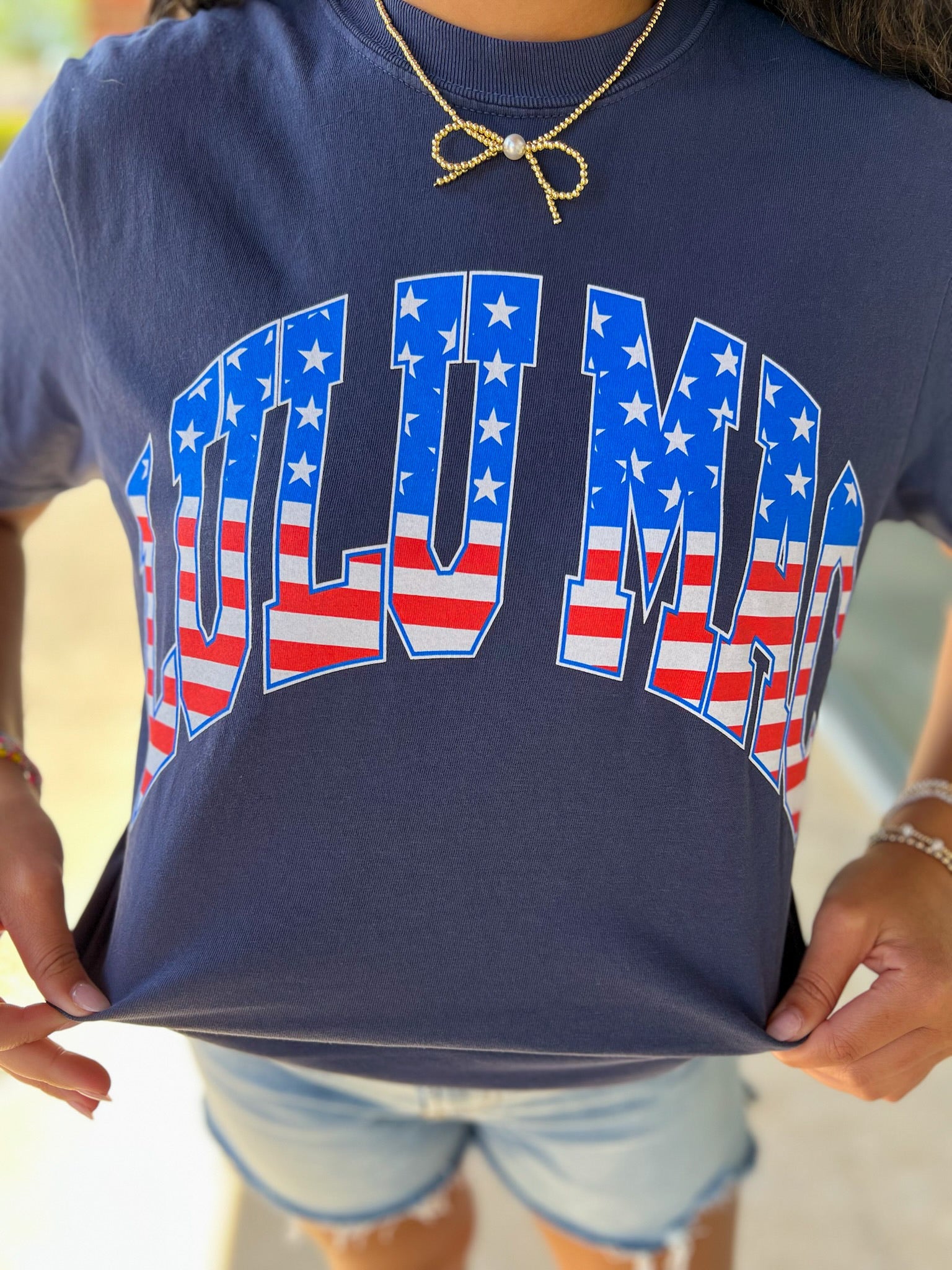 LULU MAC Navy Short Sleeve T-Shirt with American Flag Lettering - A'Bekah's Boutique