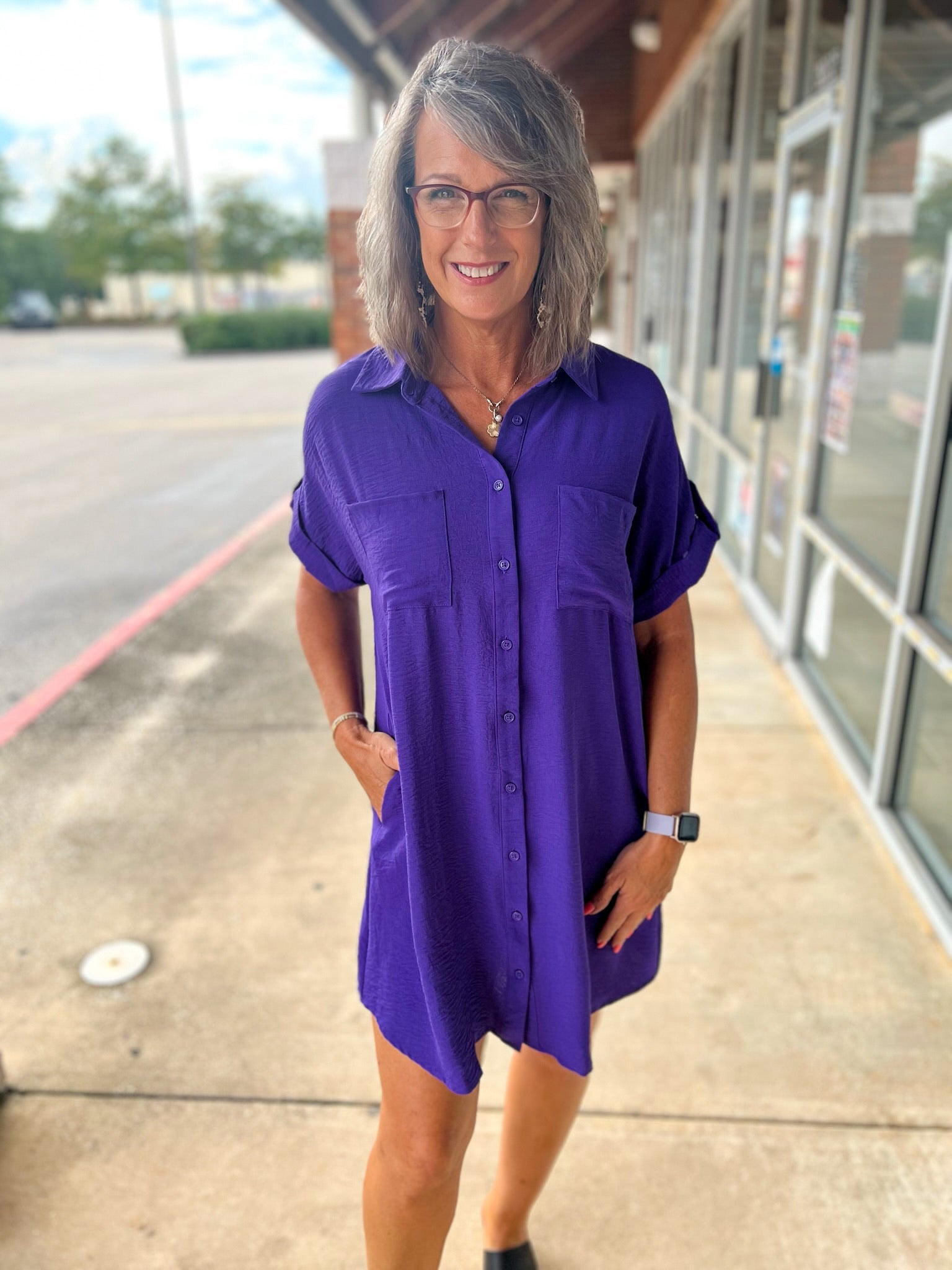 Purple button down shirt dress, collared, rolled tab short sleeves with drop shoulders. Pockets. Game day wear Louisiana, Michigan - A'Bekah's Boutique