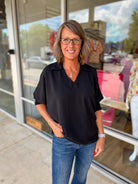Wait For Something More Black Top with Smocked Cuff Sleeves - A'Bekah's Boutique